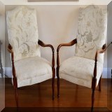 F25. Pair of open arm chairs with crewel fabric. 44”h x 26”w x 22”d - $$95 each 